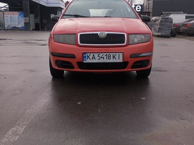 Красный Шкода Фабия, объемом двигателя 1.2 л и пробегом 196 тыс. км за 2400 $, фото 1 на Automoto.ua