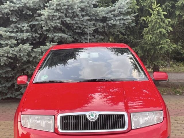 Красный Шкода Фабия, объемом двигателя 1.4 л и пробегом 250 тыс. км за 5200 $, фото 1 на Automoto.ua