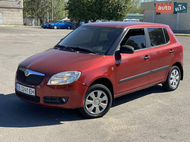 Красный Шкода Фабия, объемом двигателя 1.2 л и пробегом 234 тыс. км за 4000 $, фото 1 на Automoto.ua