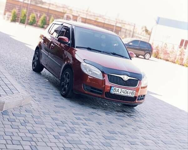 Красный Шкода Фабия, объемом двигателя 1.4 л и пробегом 200 тыс. км за 4950 $, фото 1 на Automoto.ua