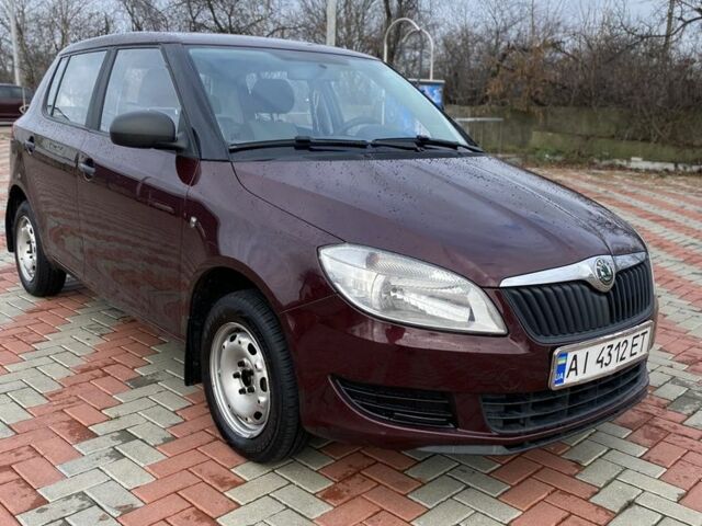 Червоний Шкода Фабія, об'ємом двигуна 1.2 л та пробігом 143 тис. км за 5500 $, фото 1 на Automoto.ua