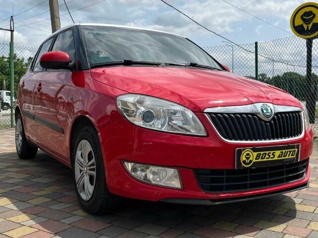Красный Шкода Фабия, объемом двигателя 1.6 л и пробегом 218 тыс. км за 5500 $, фото 1 на Automoto.ua