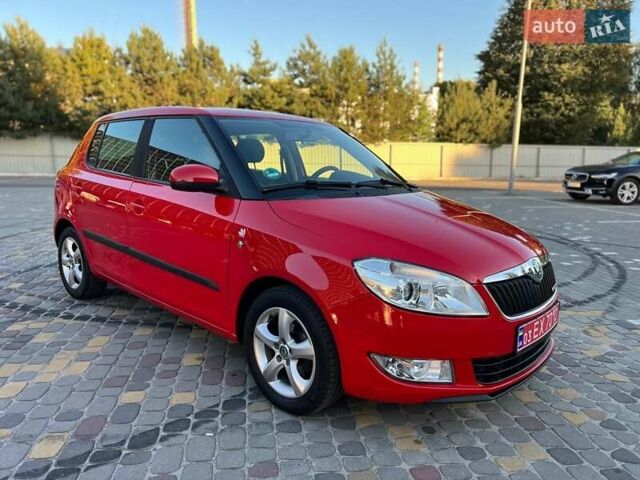 Красный Шкода Фабия, объемом двигателя 1.2 л и пробегом 211 тыс. км за 5400 $, фото 1 на Automoto.ua