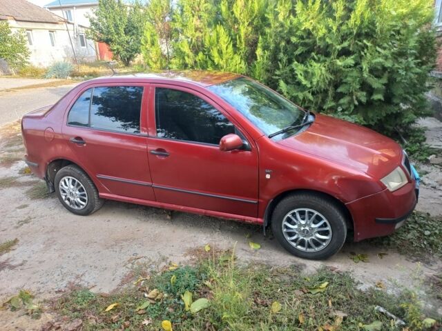 Красный Шкода Фабия, объемом двигателя 1.4 л и пробегом 298 тыс. км за 2300 $, фото 1 на Automoto.ua