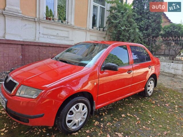 Красный Шкода Фабия, объемом двигателя 1.4 л и пробегом 210 тыс. км за 3500 $, фото 1 на Automoto.ua