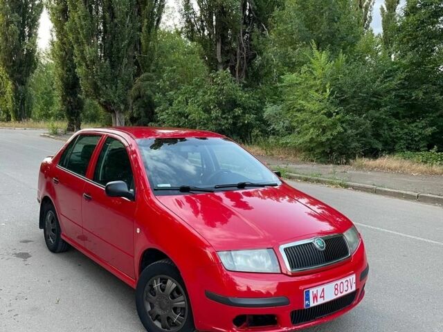 Красный Шкода Фабия, объемом двигателя 1.2 л и пробегом 252 тыс. км за 1800 $, фото 1 на Automoto.ua