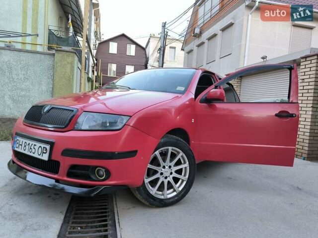 Красный Шкода Фабия, объемом двигателя 1.39 л и пробегом 274 тыс. км за 3800 $, фото 1 на Automoto.ua