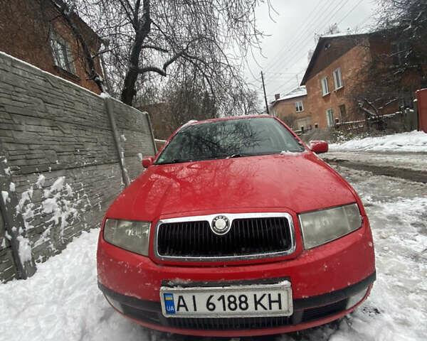 Красный Шкода Фабия, объемом двигателя 1.4 л и пробегом 353 тыс. км за 4100 $, фото 1 на Automoto.ua