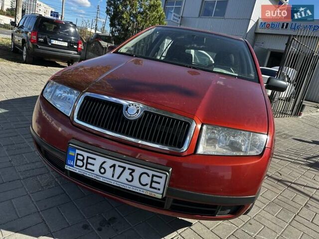 Красный Шкода Фабия, объемом двигателя 1.39 л и пробегом 180 тыс. км за 3900 $, фото 1 на Automoto.ua