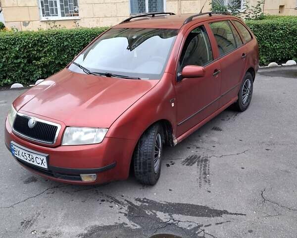 Красный Шкода Фабия, объемом двигателя 1.2 л и пробегом 268 тыс. км за 3500 $, фото 1 на Automoto.ua