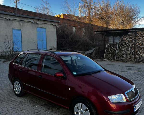 Красный Шкода Фабия, объемом двигателя 1.39 л и пробегом 174 тыс. км за 4700 $, фото 1 на Automoto.ua
