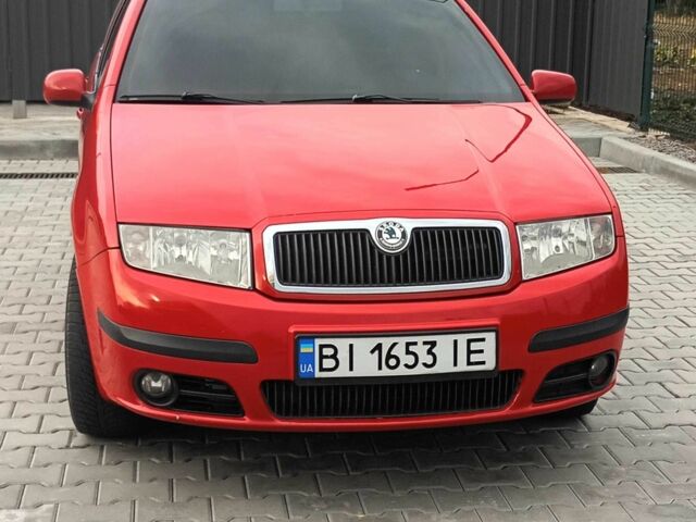 Красный Шкода Фабия, объемом двигателя 1.4 л и пробегом 390 тыс. км за 4300 $, фото 1 на Automoto.ua
