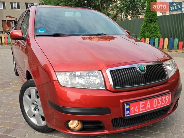 Красный Шкода Фабия, объемом двигателя 1.4 л и пробегом 141 тыс. км за 4499 $, фото 1 на Automoto.ua