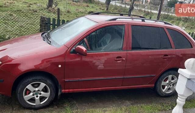 Красный Шкода Фабия, объемом двигателя 1.4 л и пробегом 255 тыс. км за 4100 $, фото 1 на Automoto.ua