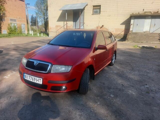 Красный Шкода Фабия, объемом двигателя 1.4 л и пробегом 292 тыс. км за 5000 $, фото 1 на Automoto.ua