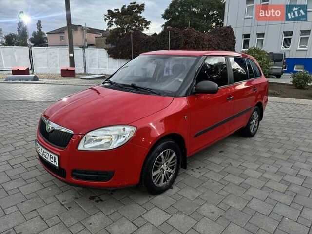Красный Шкода Фабия, объемом двигателя 1.39 л и пробегом 146 тыс. км за 5500 $, фото 1 на Automoto.ua