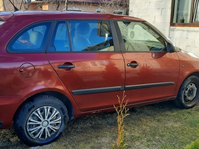 Красный Шкода Фабия, объемом двигателя 1.4 л и пробегом 340 тыс. км за 4000 $, фото 1 на Automoto.ua