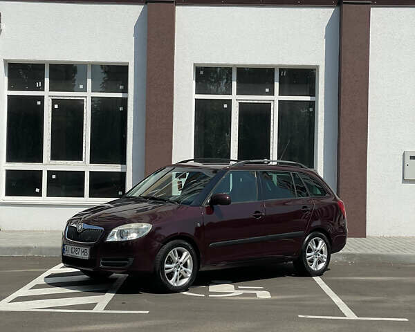 Красный Шкода Фабия, объемом двигателя 1.6 л и пробегом 208 тыс. км за 5950 $, фото 1 на Automoto.ua