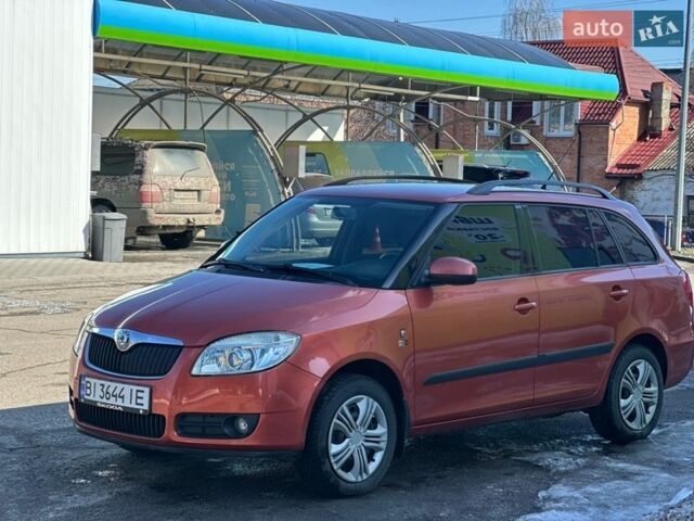 Красный Шкода Фабия, объемом двигателя 1.6 л и пробегом 293 тыс. км за 5599 $, фото 1 на Automoto.ua