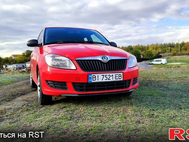 Шкода Фабия 2010 в Каменское - Днепродзержинск на Automoto.ua Красный Шкода Фабия, объемом двигателя 1.4 л и пробегом 235 тыс. км за 4100 $, фото 1 на Automoto.ua