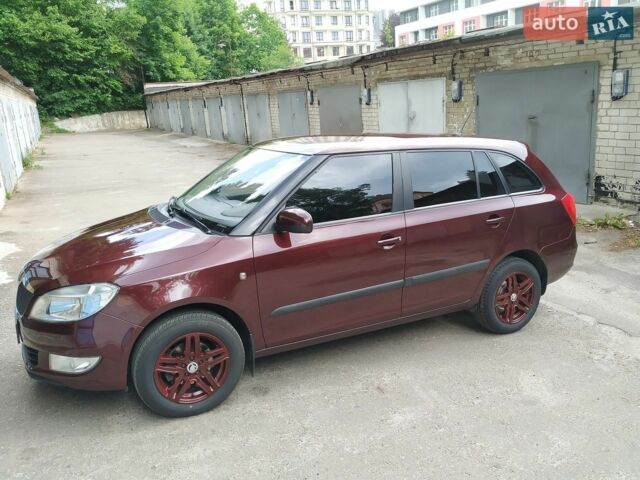 Червоний Шкода Фабія, об'ємом двигуна 1.39 л та пробігом 106 тис. км за 7600 $, фото 1 на Automoto.ua