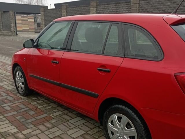 Червоний Шкода Фабія, об'ємом двигуна 1.2 л та пробігом 230 тис. км за 4500 $, фото 1 на Automoto.ua