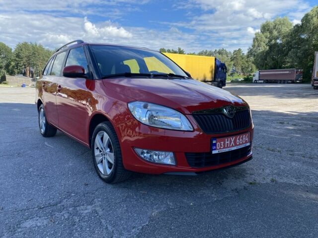 Красный Шкода Фабия, объемом двигателя 1.2 л и пробегом 236 тыс. км за 7700 $, фото 1 на Automoto.ua