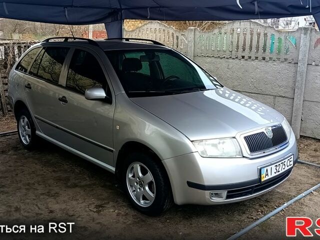 Серый Шкода Фабия, объемом двигателя 1.4 л и пробегом 93 тыс. км за 4200 $, фото 1 на Automoto.ua