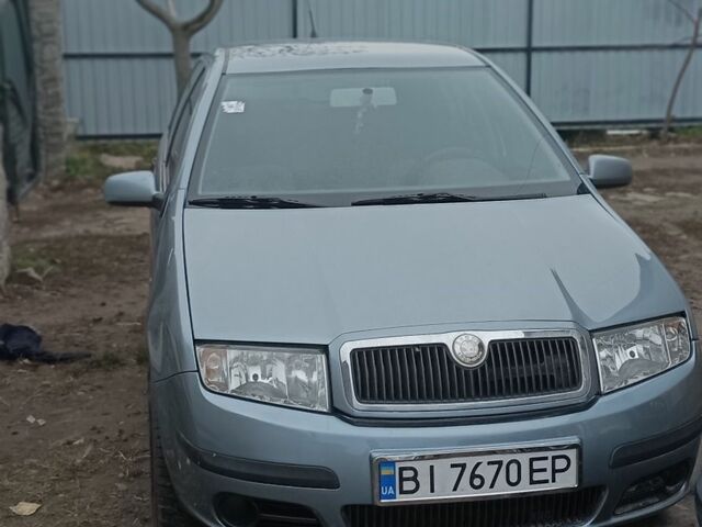 Серый Шкода Фабия, объемом двигателя 1.4 л и пробегом 208 тыс. км за 3500 $, фото 1 на Automoto.ua