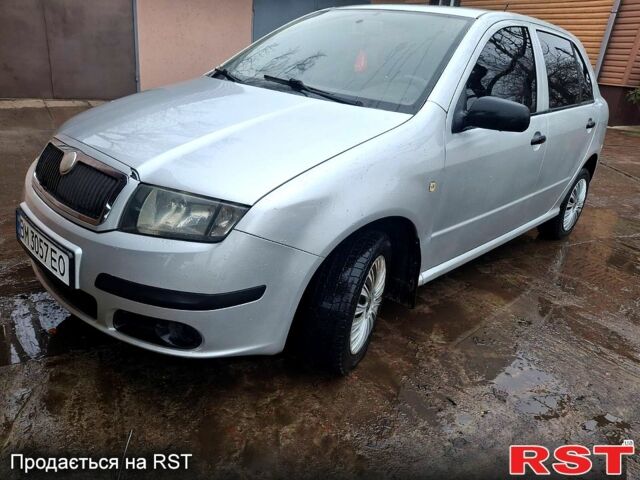 Серый Шкода Фабия, объемом двигателя 1.4 л и пробегом 210 тыс. км за 2999 $, фото 1 на Automoto.ua