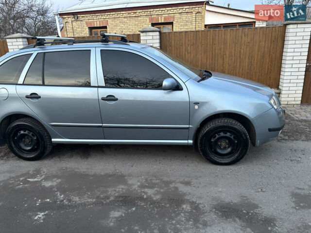 Сірий Шкода Фабія, об'ємом двигуна 1.39 л та пробігом 225 тис. км за 4200 $, фото 1 на Automoto.ua