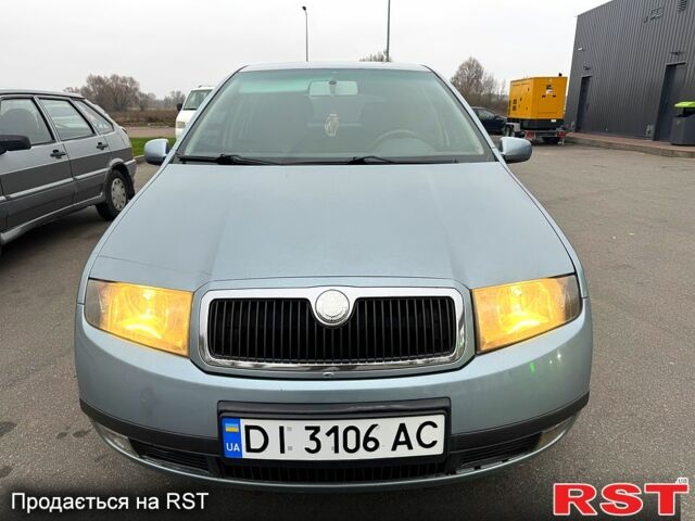 Серый Шкода Фабия, объемом двигателя 1.4 л и пробегом 140 тыс. км за 3000 $, фото 1 на Automoto.ua