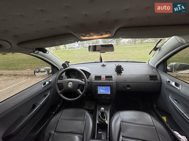 Серый Шкода Фабия, объемом двигателя 1.2 л и пробегом 260 тыс. км за 3400 $, фото 1 на Automoto.ua