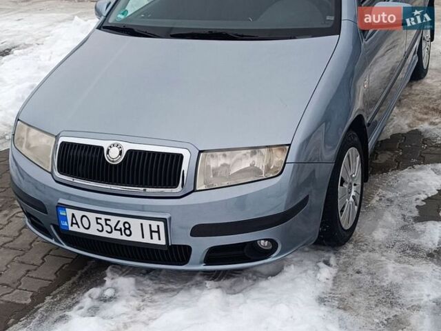 Серый Шкода Фабия, объемом двигателя 1.39 л и пробегом 258 тыс. км за 4200 $, фото 1 на Automoto.ua