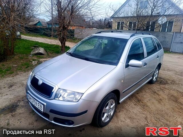 Серый Шкода Фабия, объемом двигателя 1.4 л и пробегом 190 тыс. км за 4350 $, фото 1 на Automoto.ua