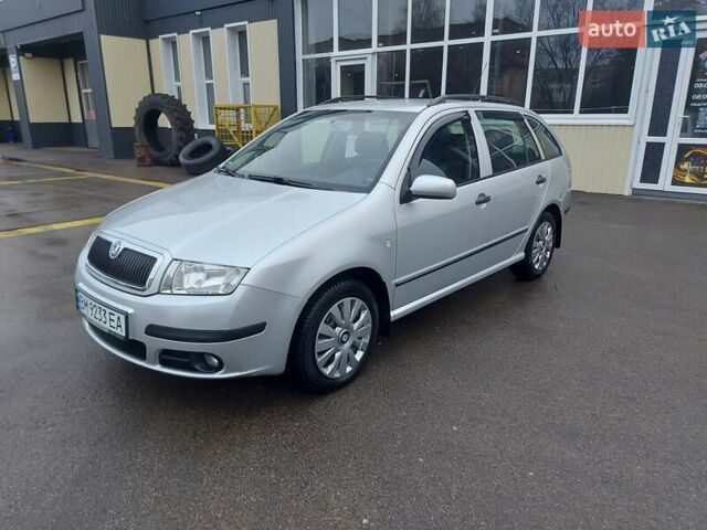 Серый Шкода Фабия, объемом двигателя 1.39 л и пробегом 100 тыс. км за 4700 $, фото 1 на Automoto.ua