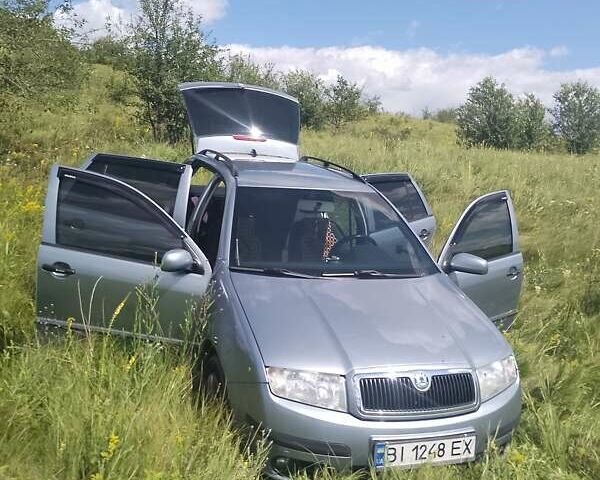 Серый Шкода Фабия, объемом двигателя 1.39 л и пробегом 241 тыс. км за 5000 $, фото 1 на Automoto.ua