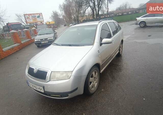 Серый Шкода Фабия, объемом двигателя 1.4 л и пробегом 150 тыс. км за 3200 $, фото 1 на Automoto.ua