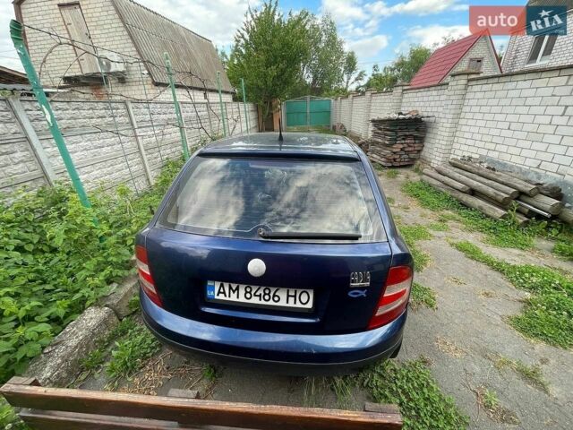 Синий Шкода Фабия, объемом двигателя 1.2 л и пробегом 200 тыс. км за 1000 $, фото 1 на Automoto.ua