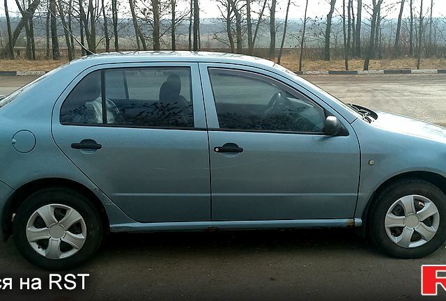 Синий Шкода Фабия, объемом двигателя 1.2 л и пробегом 325 тыс. км за 2600 $, фото 1 на Automoto.ua