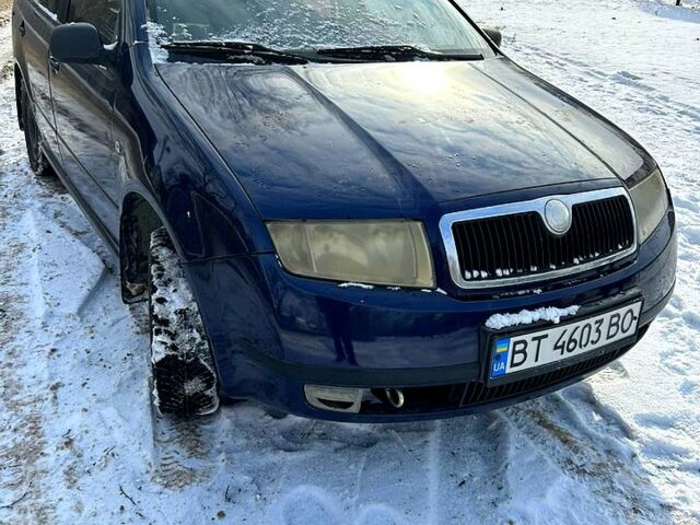 Синий Шкода Фабия, объемом двигателя 1.4 л и пробегом 190 тыс. км за 1600 $, фото 1 на Automoto.ua