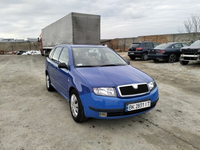 Синий Шкода Фабия, объемом двигателя 1.4 л и пробегом 250 тыс. км за 1800 $, фото 1 на Automoto.ua