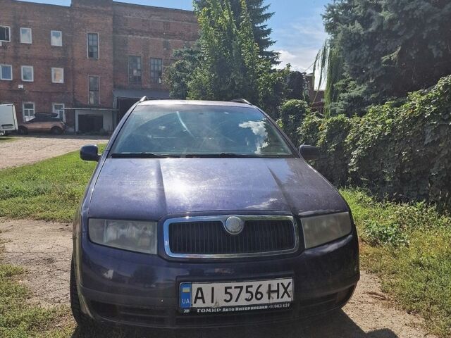 Синий Шкода Фабия, объемом двигателя 1.39 л и пробегом 414 тыс. км за 2100 $, фото 1 на Automoto.ua
