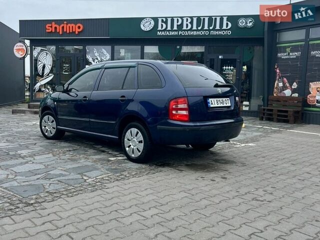 Синий Шкода Фабия, объемом двигателя 1.4 л и пробегом 125 тыс. км за 4499 $, фото 1 на Automoto.ua