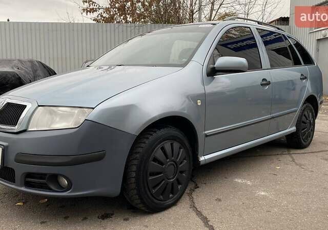 Синий Шкода Фабия, объемом двигателя 1.39 л и пробегом 301 тыс. км за 4100 $, фото 1 на Automoto.ua