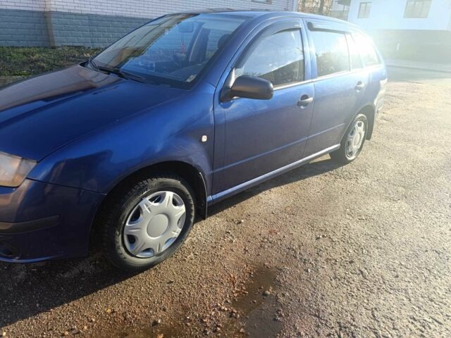 Синий Шкода Фабия, объемом двигателя 1.2 л и пробегом 338 тыс. км за 1500 $, фото 1 на Automoto.ua