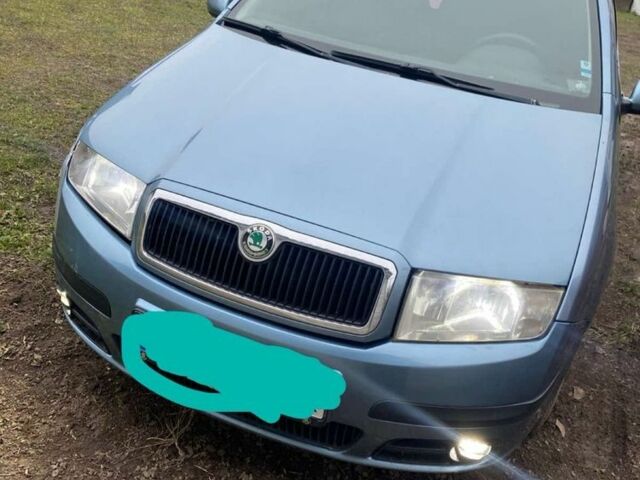 Синий Шкода Фабия, объемом двигателя 1.2 л и пробегом 370 тыс. км за 3450 $, фото 1 на Automoto.ua