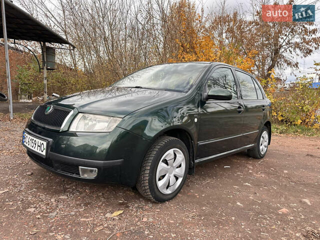Зеленый Шкода Фабия, объемом двигателя 1.4 л и пробегом 297 тыс. км за 2999 $, фото 1 на Automoto.ua