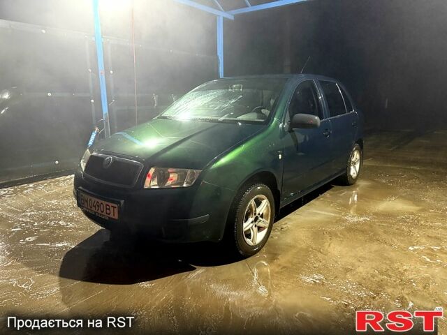 Зеленый Шкода Фабия, объемом двигателя 1.4 л и пробегом 100 тыс. км за 3500 $, фото 1 на Automoto.ua