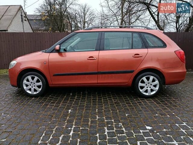 Помаранчевий Шкода Фабія, об'ємом двигуна 1.39 л та пробігом 234 тис. км за 5750 $, фото 1 на Automoto.ua